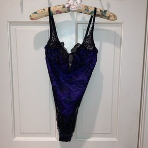 Purple with black lace one piece intimate wear. Victoria Secret.